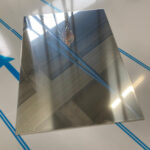 Impercold polished stainless steel sheet, with reflective surface for technical and design applications.